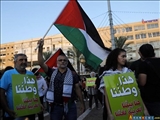 فلسطینیان در تل آویو علیه مصوبه یهودی سازی تظاهرات کردند